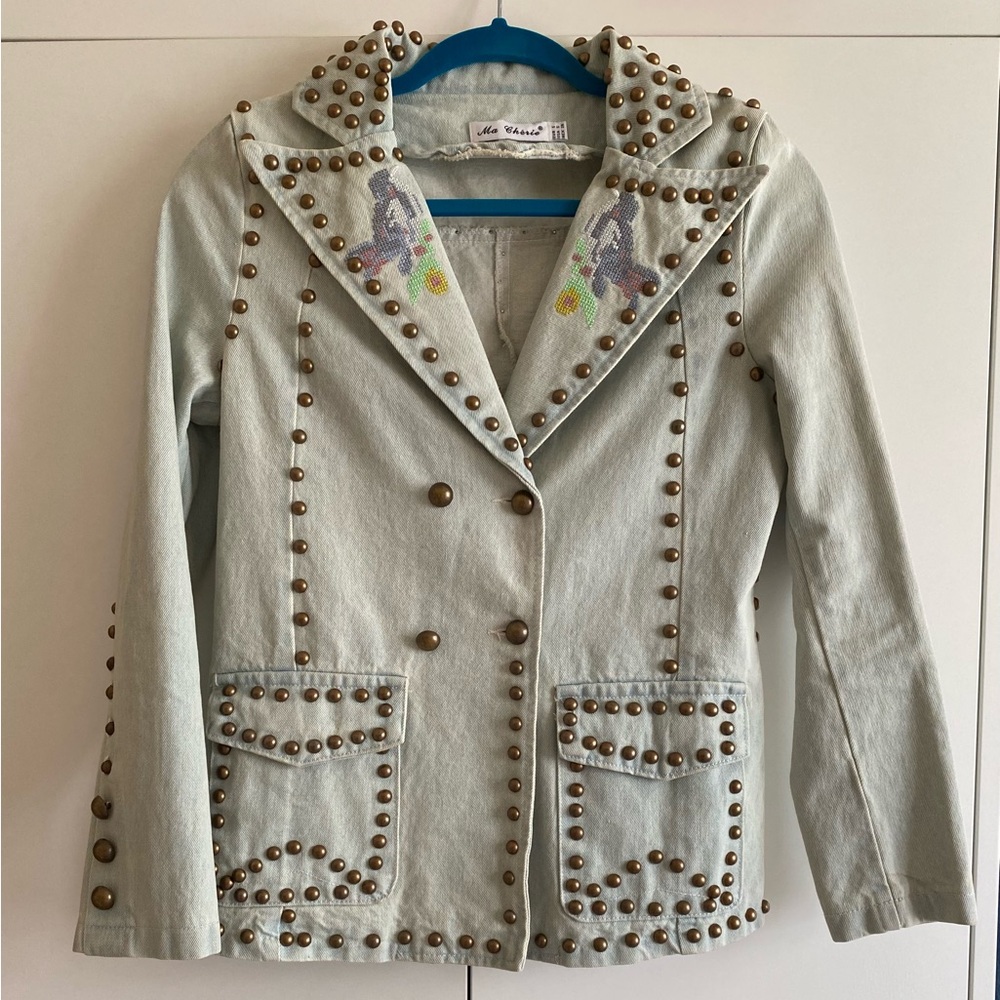 Embroidered embellished denim jacket.